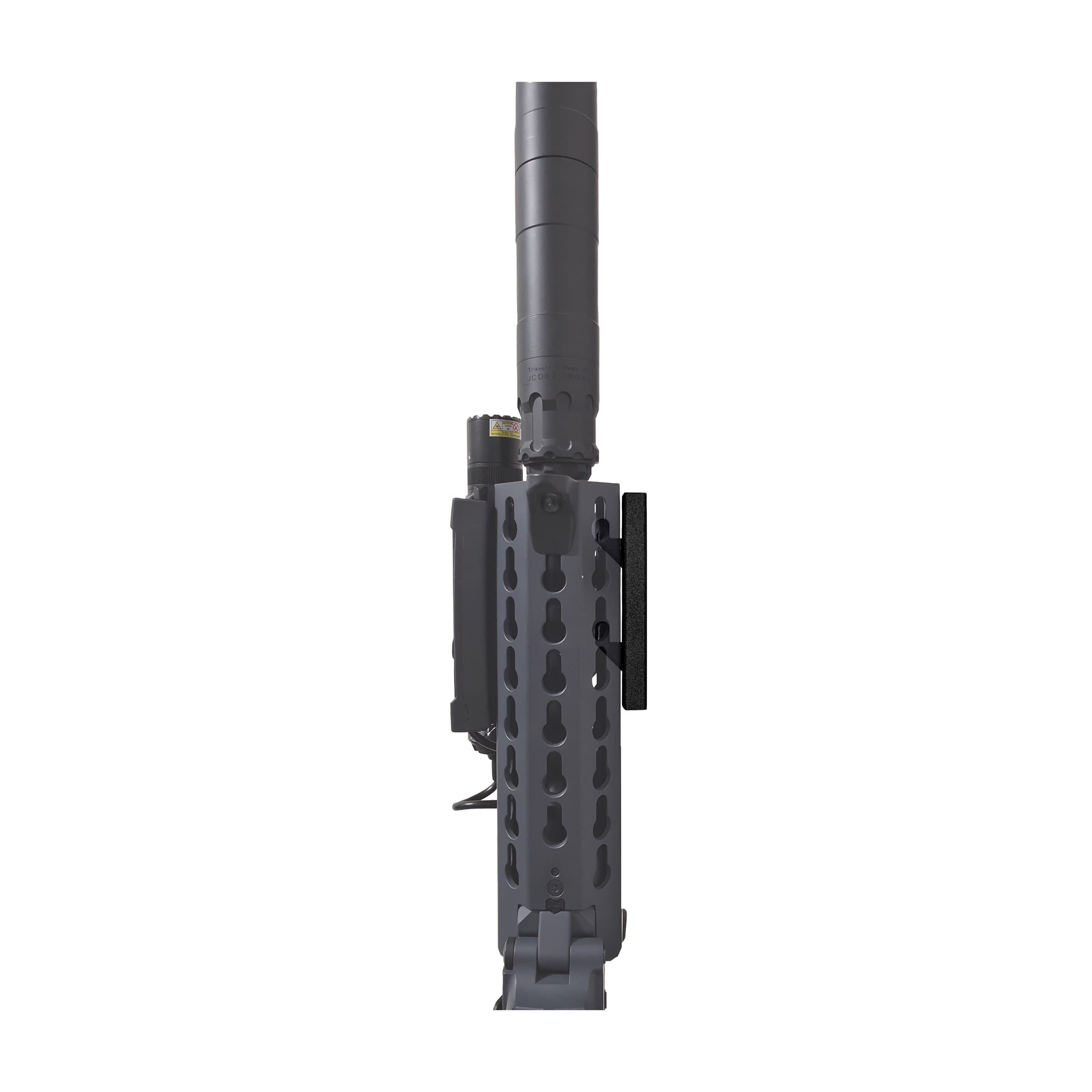 AR rifle hanging from a KeyMod flush wall mount